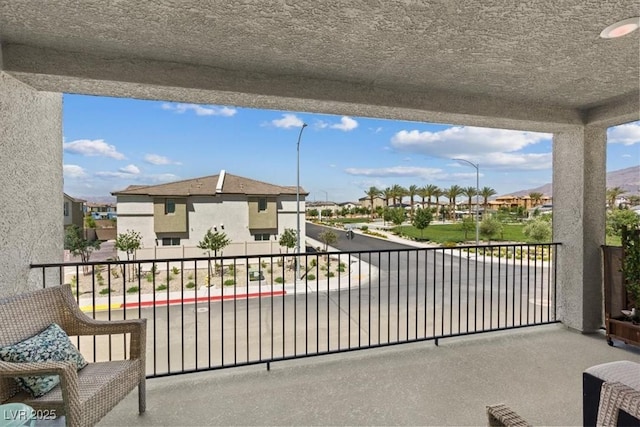 balcony featuring a residential view