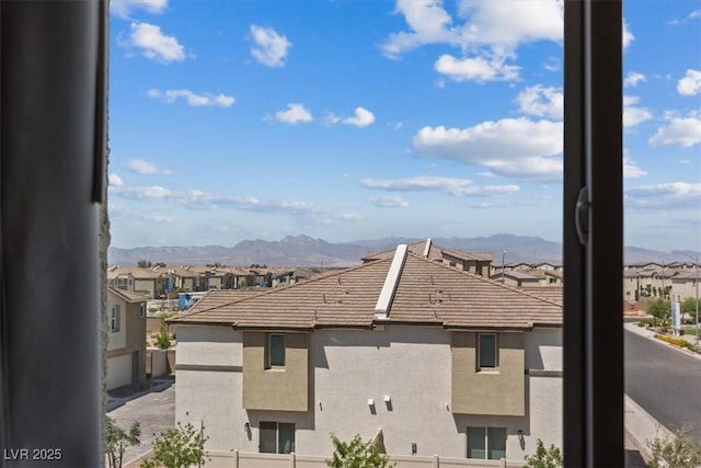 mountain view featuring nearby suburban area