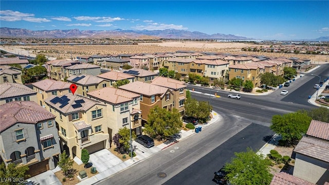 aerial perspective of suburban area with mountains
