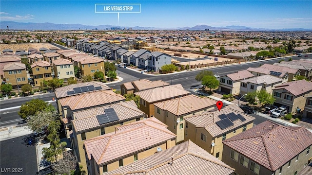 aerial perspective of suburban area featuring a mountainous background