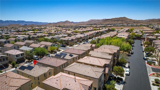 aerial perspective of suburban area with a mountain backdrop