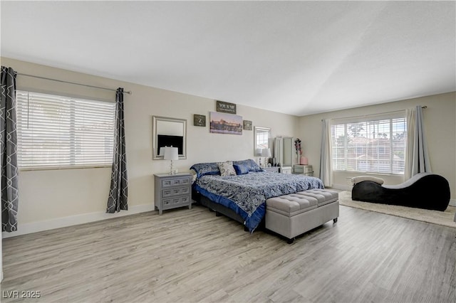 4 Tarryall Ter, Henderson, NV 89074 - bedroom featuring light wood-type flooring, baseboards, and lofted ceiling