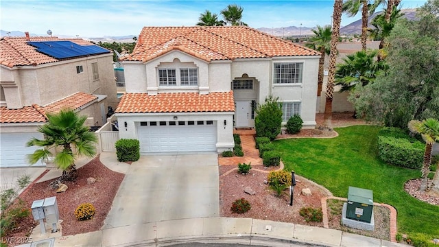 4 Tarryall Ter, Henderson, NV 89074 - mediterranean / spanish house with a tiled roof, concrete driveway, stucco siding, and a garage