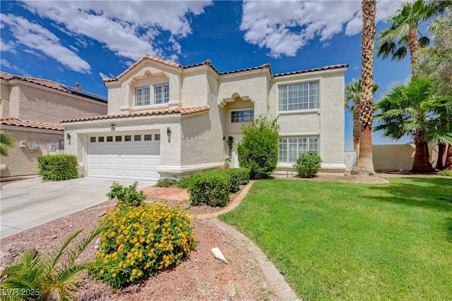 4 Tarryall Ter, Henderson, NV 89074 - mediterranean / spanish home with stucco siding, an attached garage, concrete driveway, a tiled roof, and a front lawn