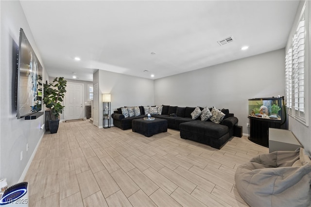 3854 Stadium Ave, Las Vegas, NV 89120 - living room featuring wood finished floors, baseboards, and recessed lighting
