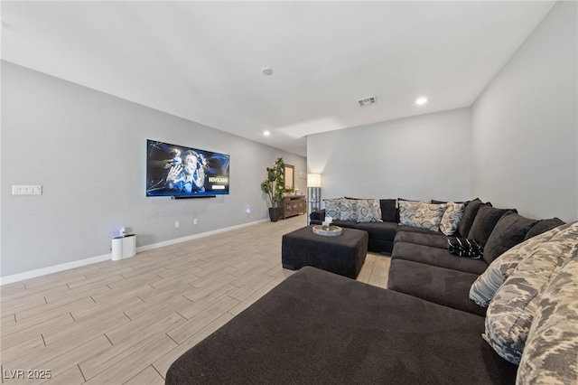 3854 Stadium Ave, Las Vegas, NV 89120 - living room with wood tiled floors, recessed lighting, and baseboards