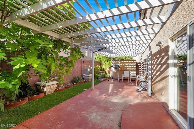 view of patio with a fenced backyard and a pergola