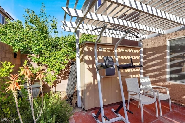 view of patio / terrace featuring a fenced backyard and a pergola