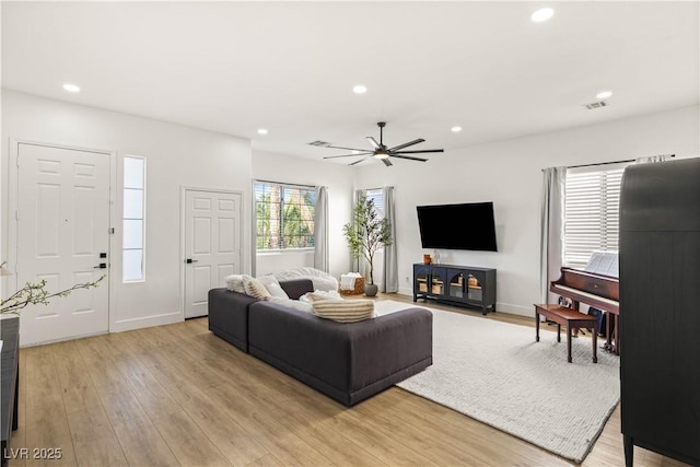 8317 Fritzen Ave, Las Vegas, NV 89131 - living area with recessed lighting, light wood-type flooring, a ceiling fan, and baseboards