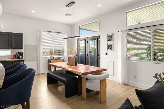 8317 Fritzen Ave, Las Vegas, NV 89131 - dining space with healthy amount of natural light, light wood-style floors, baseboards, and recessed lighting
