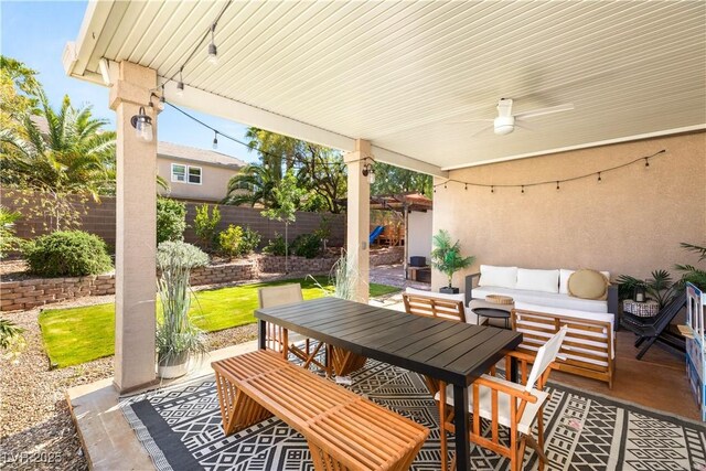 8317 Fritzen Ave, Las Vegas, NV 89131 - view of patio with a fenced backyard and outdoor dining space