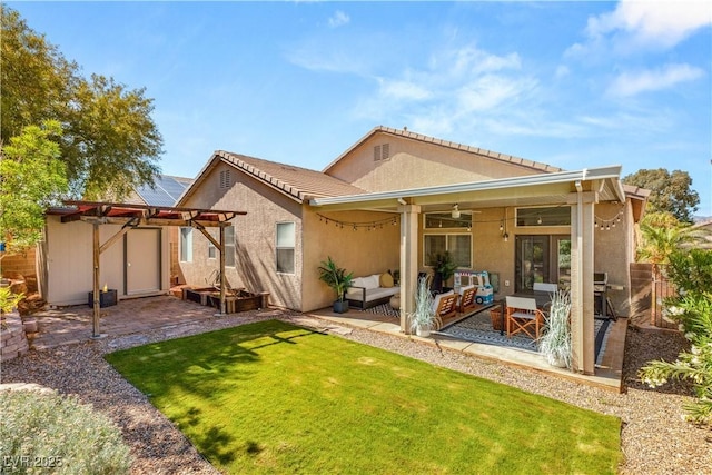8317 Fritzen Ave, Las Vegas, NV 89131 - rear view of property with an outdoor living space, stucco siding, a patio, a pergola, and a ceiling fan
