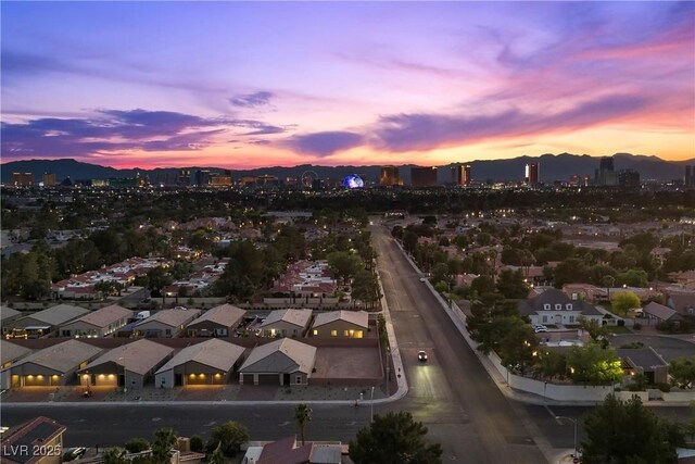 3706 Etendre Ct, Las Vegas, NV 89121 - aerial view of property and surrounding area featuring nearby urban area and a mountain backdrop