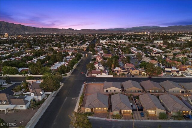 3706 Etendre Ct, Las Vegas, NV 89121 - aerial overview of property's location with mountains and nearby suburban area