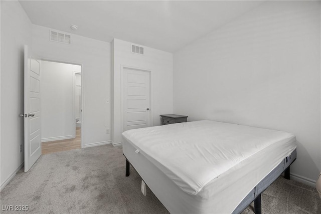 3706 Etendre Ct, Las Vegas, NV 89121 - carpeted bedroom with baseboards and lofted ceiling