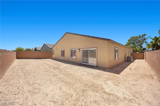 3706 Etendre Ct, Las Vegas, NV 89121 - rear view of property with stucco siding, central air condition unit, and a fenced backyard