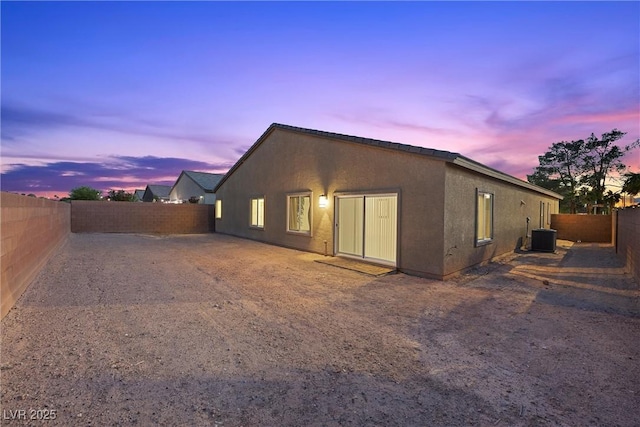 3706 Etendre Ct, Las Vegas, NV 89121 - back of property with a fenced backyard, central AC, and stucco siding