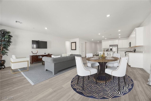 3706 Etendre Ct, Las Vegas, NV 89121 - dining space featuring light wood-style flooring, recessed lighting, and baseboards