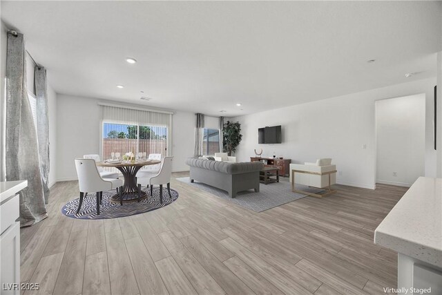 3706 Etendre Ct, Las Vegas, NV 89121 - dining room featuring light wood-style floors, recessed lighting, and baseboards