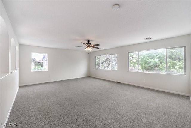 3065 Blue Monaco St, Las Vegas, NV 89117 - spare room featuring ceiling fan, carpet, and a smoke detector
