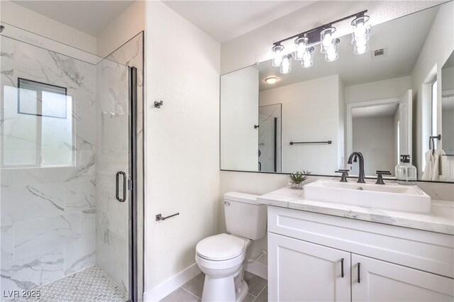 3065 Blue Monaco St, Las Vegas, NV 89117 - full bath with a marble finish shower, vanity, and tile patterned floors