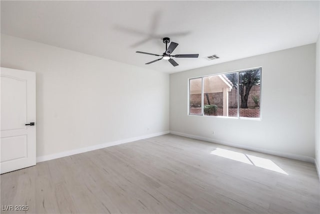 3065 Blue Monaco St, Las Vegas, NV 89117 - empty room featuring light wood-style flooring and a ceiling fan