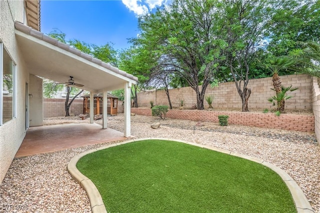3065 Blue Monaco St, Las Vegas, NV 89117 - fenced backyard featuring a ceiling fan and a patio area