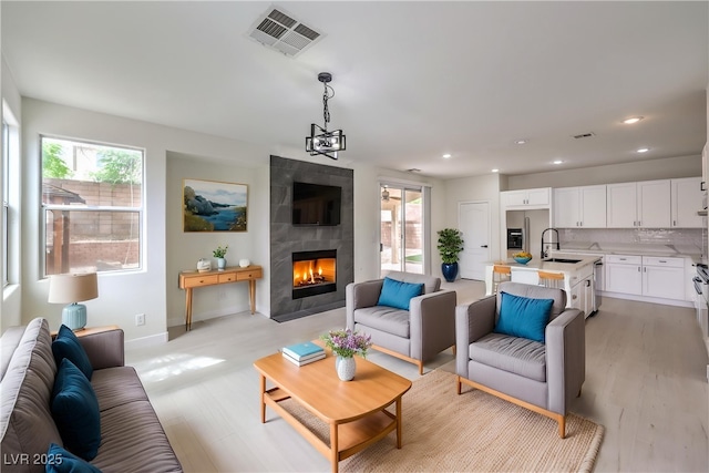 3065 Blue Monaco St, Las Vegas, NV 89117 - living area with a fireplace and recessed lighting