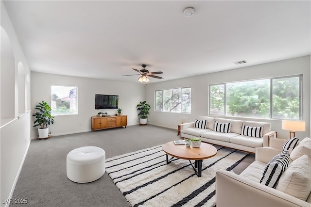 3065 Blue Monaco St, Las Vegas, NV 89117 - living area featuring ceiling fan and light carpet