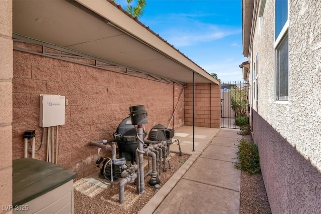view of patio / terrace featuring a gate