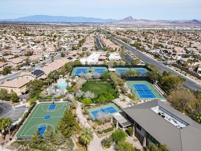 aerial perspective of suburban area with a mountain backdrop
