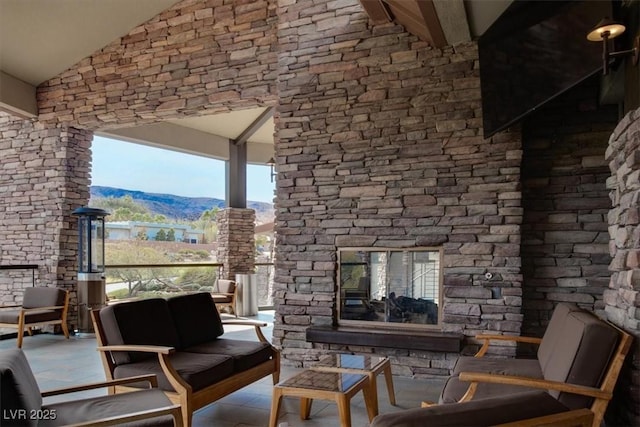 view of patio / terrace with outdoor lounge area and a mountain view