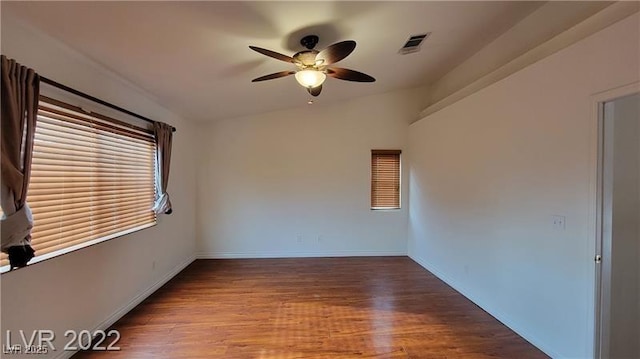 1211 Silver Knoll Ave, Las Vegas, NV 89123 - unfurnished room with ceiling fan, wood finished floors, baseboards, and vaulted ceiling