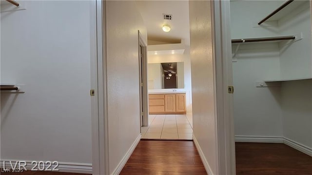 1211 Silver Knoll Ave, Las Vegas, NV 89123 - hallway with wood finished floors and baseboards