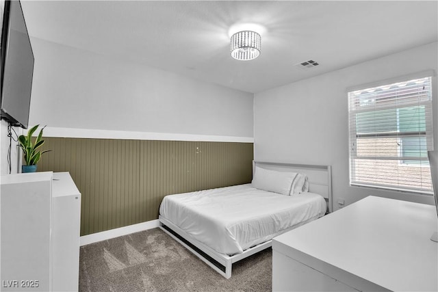 7545 Fontera Ct, Las Vegas, NV 89139 - bedroom featuring wainscoting and carpet flooring