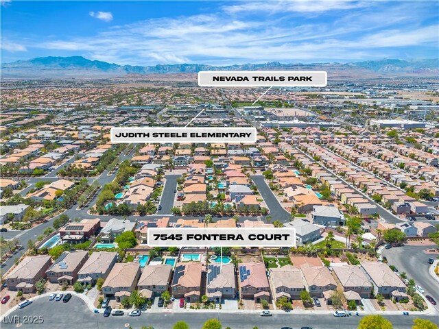 7545 Fontera Ct, Las Vegas, NV 89139 - aerial perspective of suburban area featuring a mountainous background