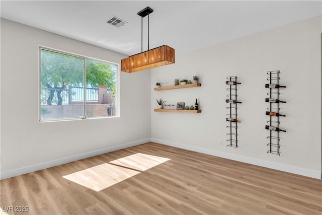 1551 Boundary Peak Way, Las Vegas, NV 89135 - unfurnished dining area with light wood-style floors and baseboards