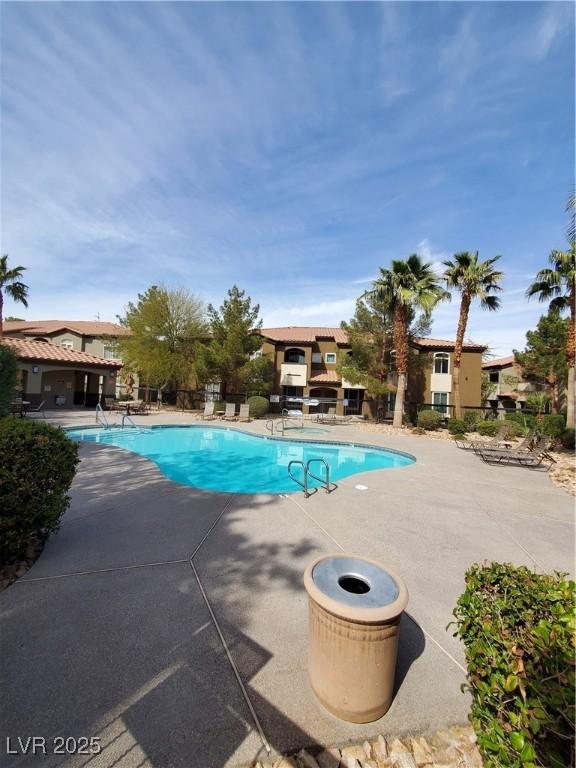 9000 Las Vegas Blvd Unit 1250, Las Vegas, NV 89123 - community pool with a patio and fence