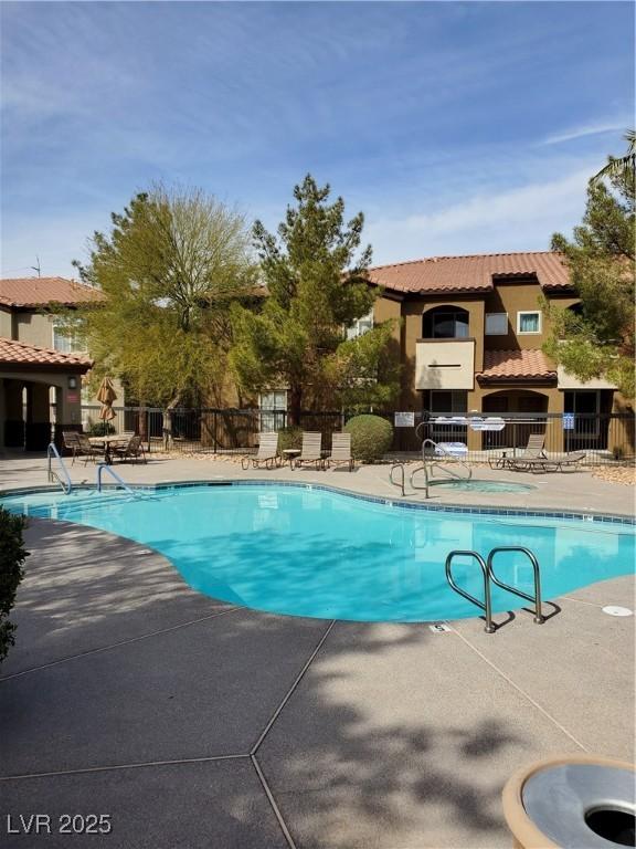 9000 Las Vegas Blvd Unit 1250, Las Vegas, NV 89123 - community pool with fence and a patio area