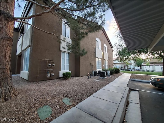 9000 Las Vegas Blvd Unit 1250, Las Vegas, NV 89123 - view of property exterior with stucco siding and cooling unit