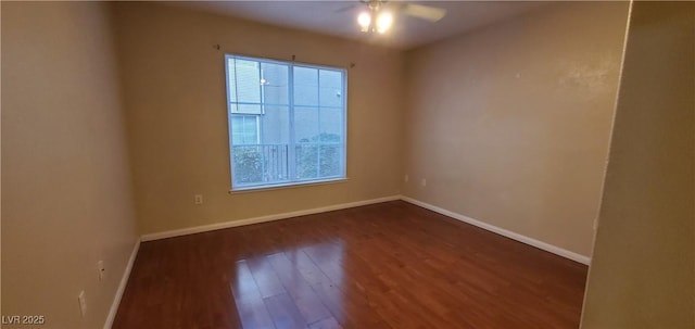 9000 Las Vegas Blvd Unit 1250, Las Vegas, NV 89123 - empty room featuring a ceiling fan, dark wood-style floors, and baseboards