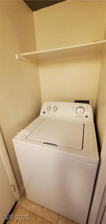 9000 Las Vegas Blvd Unit 1250, Las Vegas, NV 89123 - washroom featuring washer / dryer and light tile patterned floors