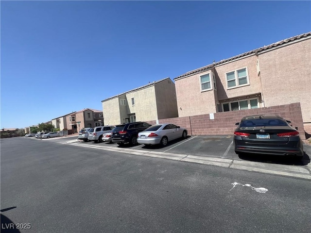 6545 Netherseal Ave, Las Vegas, NV 89139 - view of property featuring uncovered parking and fence