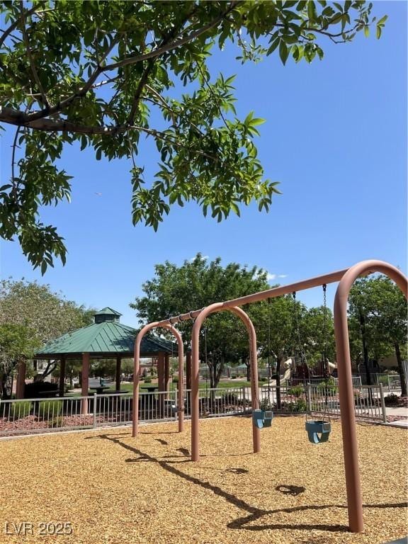 6545 Netherseal Ave, Las Vegas, NV 89139 - communal playground with a gazebo and fence