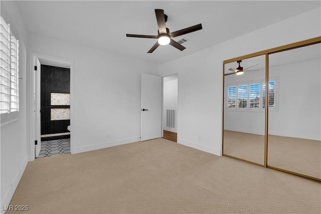 2058 Citroen St, Las Vegas, NV 89142 - unfurnished bedroom with carpet, a closet, ensuite bathroom, and baseboards