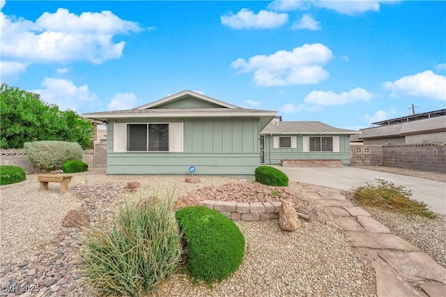 2058 Citroen St, Las Vegas, NV 89142 - view of front facade with fence