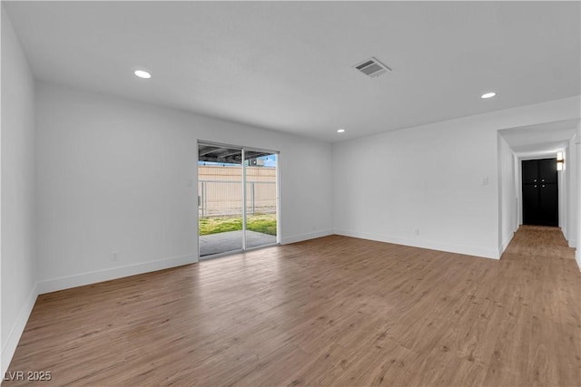 2058 Citroen St, Las Vegas, NV 89142 - unfurnished room with light wood finished floors, recessed lighting, and baseboards