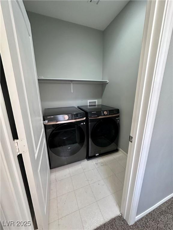 3964 Irvin Ave, Las Vegas, NV 89141 - laundry area featuring washing machine and dryer and baseboards