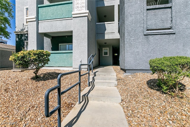 6955 N Durango Dr Unit 2081, Las Vegas, NV 89149 - doorway to property with stucco siding