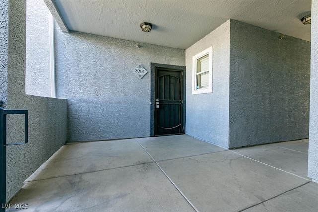 6955 N Durango Dr Unit 2081, Las Vegas, NV 89149 - doorway to property with stucco siding